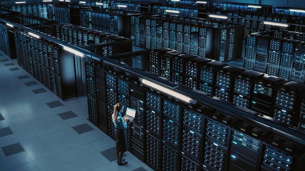An engineer standing after build a multimedia server